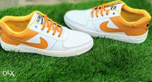 Pair Of White-and-orange Nike Air Force 1 Low