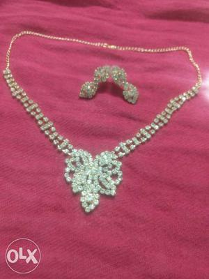 Silver-colored Diamond Encrusted Necklace With Earrings