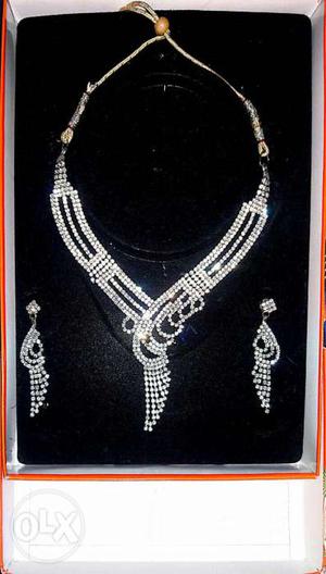 Silver-colored Necklace With Matching Pair Of Earrings