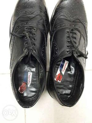Size 8 black formal shoes in very good condition.used only