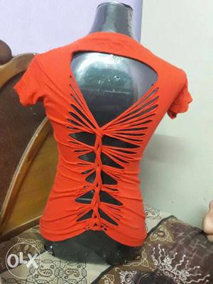 This new and fashionable top is handmade and good