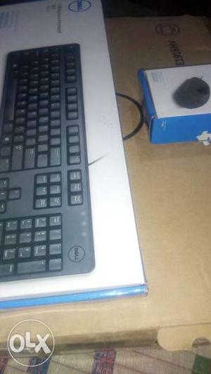 Two Black Computer Mouse And Keyboard Boxes