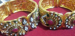 Two Gemstone Encrusted Gold-colored Cuff Bangles
