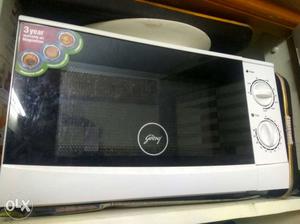 White And Grey Microwave Oven