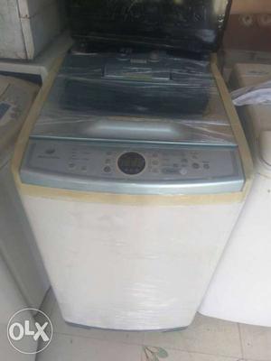 White And Grey Top-load Laundry Appliance