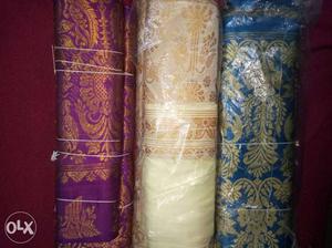 White, Brown, And Blue And Purple Floral Textiles