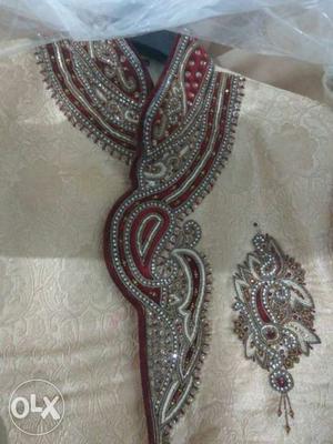 White, Red, And Silver Sherwani Dress