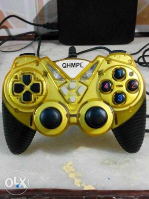 Yellow And Black Game Controller