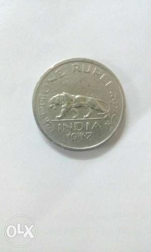 1 rupee coin of  and 1/2 rupee coin of 