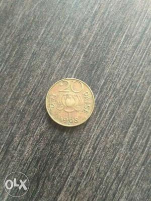 50yrs old gold coloured 20 paisa coin.(yr)for sale.