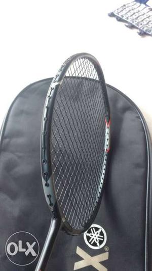 Black And Gray Badminton Racket With Yonex Bag