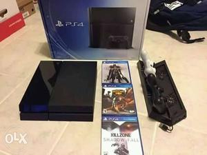 Black Sony PS4 Console With Controller And Game Cases