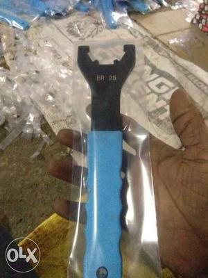 Blue And Black Hand Tool