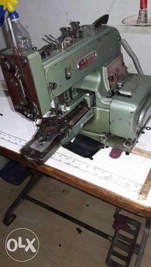 Gray And Black Electronic Sewing Machine