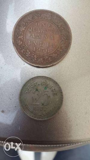 Old coins one Anna and 25 paise