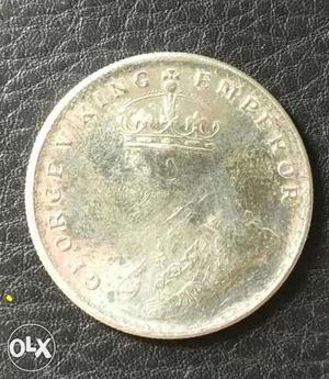 Silver-colored George V King Emperor Coin