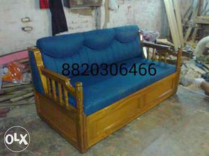 Brown Wooden Framed Blue Velvet Padded Couch