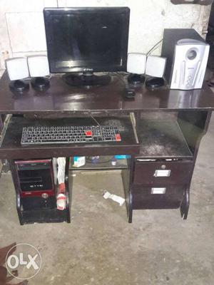 Computer in good condition with table. I never