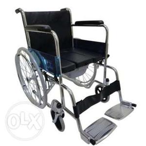 Grey Stainless Steel Framed Black Seat Wheelchair