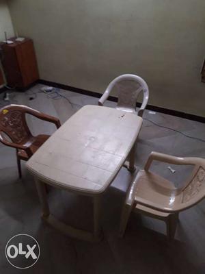 Plastic table with 3 chair