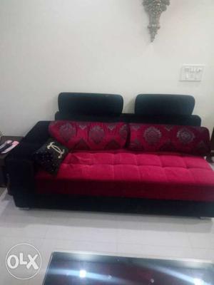 Red and black sofa 6 month old