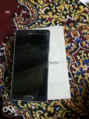 Samsung Galaxy Note 4 box charger good condition 4g