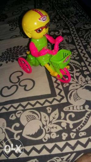 Yellow And Pink Plastic Bike Toy