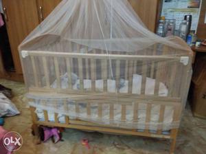 Mee Mee's Baby Cot with Cradle and accessories.