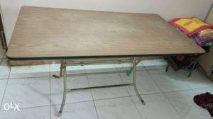 Rectangular Brown Wooden Table With Gray Metal Base