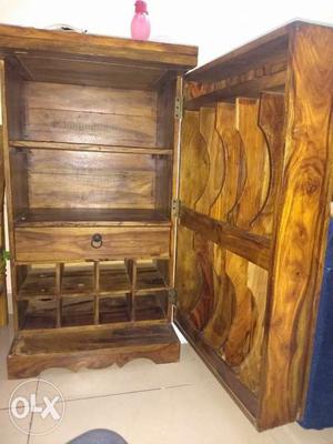 Saagwan wood bar cabinet. hand carved