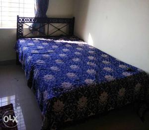 Wrought iron bed (queen size) with mattress for