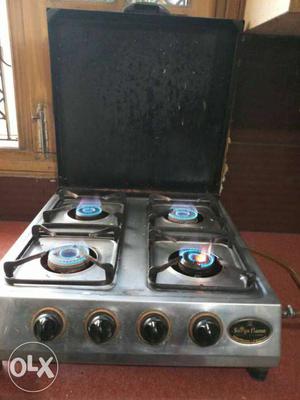 4 burner gas stove in running condition