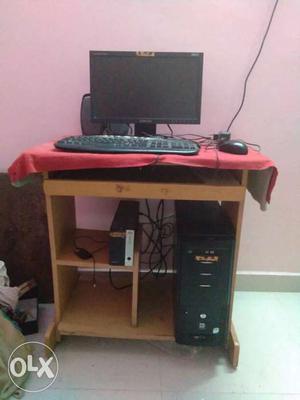 Black Flat Screen Computer Monitor; Tower; Keyboard; Mouse