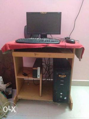 Black Flat Screen Computer Monitor With Keyboard, Mouse, And