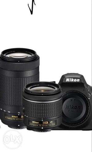 Black Nikon DSLR Camera With Two Lens