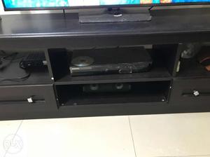 Black Wooden TV Stand With Flat Screen Television