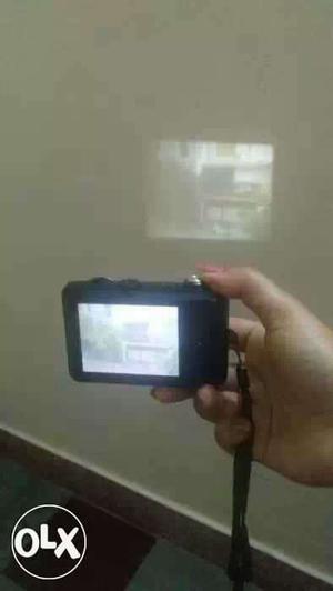 Nikon HD camera with projector and touchscreen