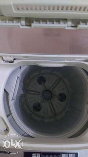 Pink And White Top-load Clothes Washer