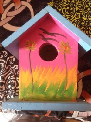 Pink, Yellow And Blue Wooden Bird House