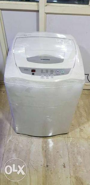 Samsung fuzzy logic 5.5kg top-load washing machine with free