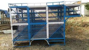 Blue And White Metal Cage
