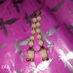 Hangings for sale white and Golden only on 70 Rs