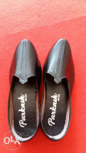 Pair Of Black Parkash Leather Loafers