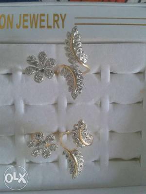 Pair Of Silver-colored-and-gold-colored Leaf Earrings With