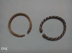 Two Gold-colored Cuff Bracelets