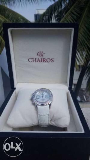 A beautiful Chairos costly watch.White color, It's a ladies