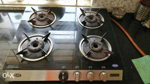 Black And Gray 4-burner Gas Cooktop