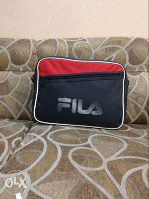 Black and red filla Leather bag