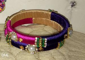Gold-colored And White Pearl Encrusted Silk Thread Bangles