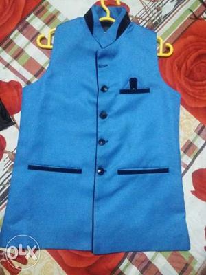 Half blue coat for 10 to 14 years old boy...
